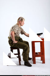 Man Adult Average White Fighting with gun Sitting poses Army