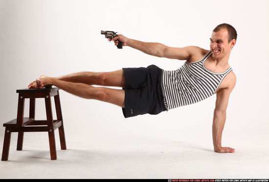 Man Adult Athletic White Fighting with gun Moving poses Sportswear