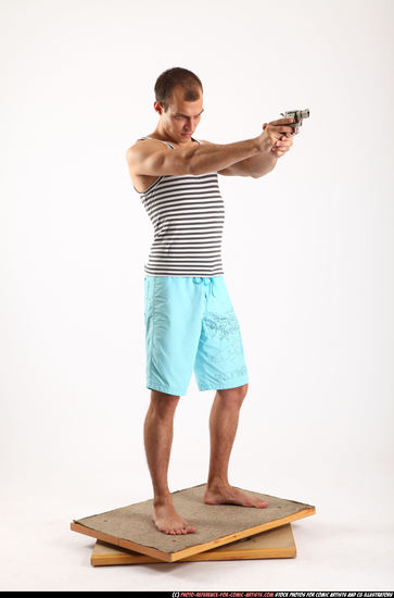 Man Adult Athletic White Fighting with gun Standing poses Sportswear