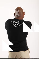 Man Old Chubby Black Fighting with gun Standing poses Casual