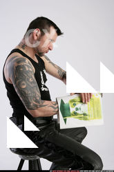 2011 01 SERDYUK SITTING HIDING REVOLVER 06