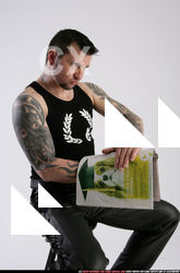 2011 01 SERDYUK SITTING HIDING REVOLVER 07