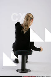 Woman Adult Athletic White Daily activities Sitting poses Casual