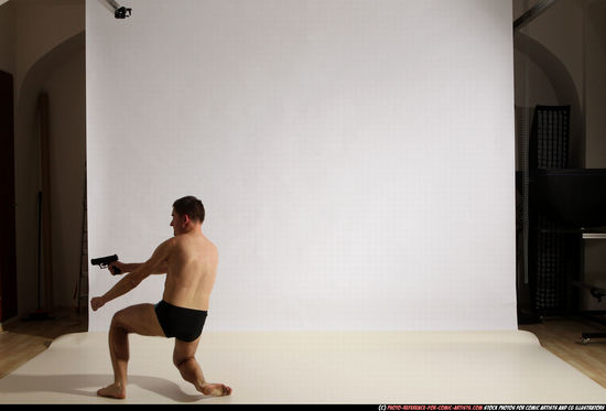 Man Adult Athletic White Fighting with gun Moving poses Underwear