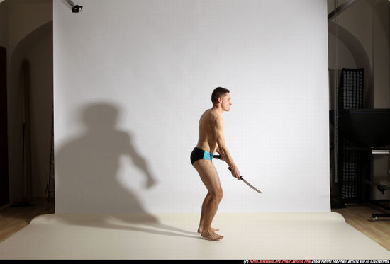 Man Adult Athletic White Fighting with sword Moving poses Underwear