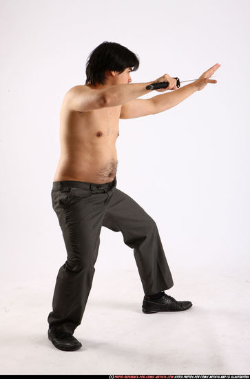 Man Adult Average Fighting with sword Fight Casual Asian