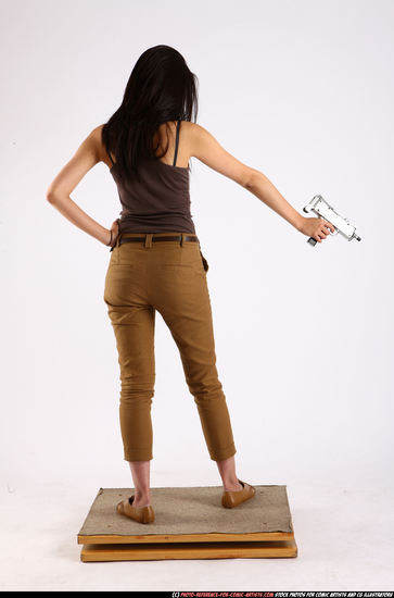 Woman Young Athletic Fighting with submachine gun Standing poses Army Asian