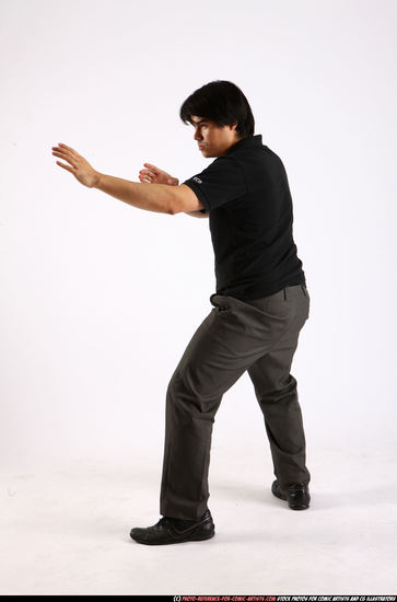Man Adult Average Fist fight Standing poses Casual Asian
