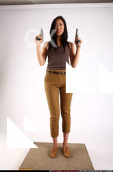 2011 09 NAOMI DUAL PISTOLS POSE1 00 C