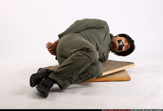 Man Adult Average Neutral Laying poses Army Asian