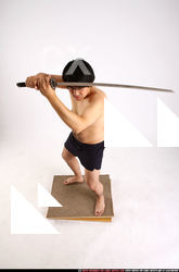 Man Adult Average Fighting with sword Standing poses Underwear Asian