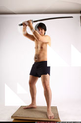 Man Adult Average Fighting with sword Standing poses Underwear Asian