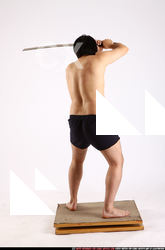 Man Adult Average Fighting with sword Standing poses Underwear Asian