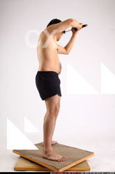 Man Adult Average Fighting with sword Standing poses Underwear Asian