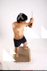 Man Adult Average Fighting with sword Standing poses Underwear Asian