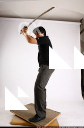 Man Adult Average Fighting with sword Standing poses Casual Asian