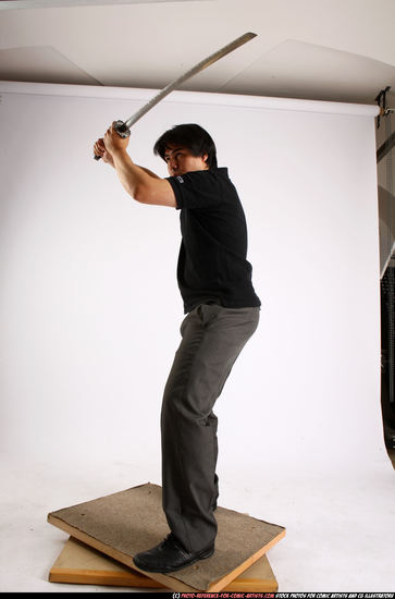 Man Adult Average Fighting with sword Standing poses Casual Asian