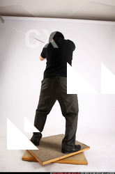 Man Adult Average Fighting with sword Standing poses Casual Asian