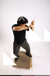 Man Adult Average Fighting with sword Standing poses Casual Asian