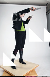 2012 01  NADIYA DUAL PISTOLS POSE1 01 C