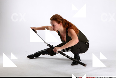 Woman Adult Athletic White Fighting with sword Kneeling poses Casual