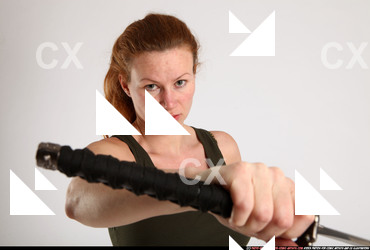 2012 08 NADIYA UNSHEATHING SWORD SWING 09