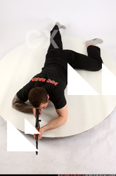 2013 06 ALEX LAYING AIMING AK-47 00 A