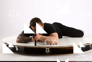 2013 06 ALEX LAYING AIMING AK-47 00 B