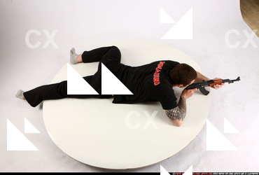 Man Adult Athletic White Fighting with submachine gun Laying poses Sportswear