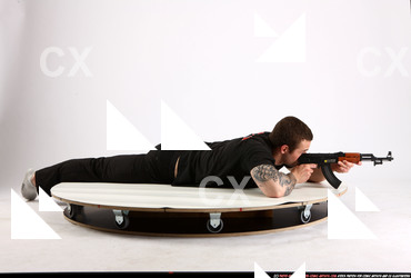 2013 06 ALEX LAYING AIMING AK-47 02 B