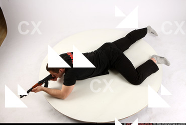 Man Adult Athletic White Fighting with submachine gun Laying poses Sportswear