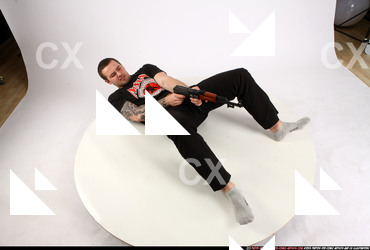 Man Adult Athletic White Fighting with submachine gun Laying poses Casual