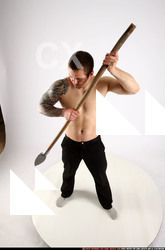 Man Adult Athletic White Fighting with spear Standing poses Pants