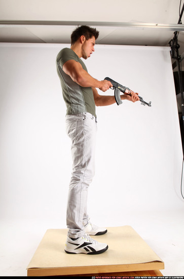 Man Adult Muscular White Fighting with submachine gun Standing poses Casual