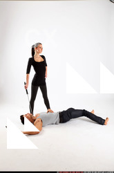 Man & Woman Adult Athletic White Fighting with sword Execution Casual