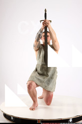 2014 03 ALEX PREHISTORIC SWORD POSE2 00 B