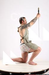 Man Adult Athletic White Fighting with sword Kneeling poses Army