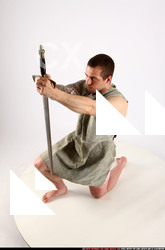 Man Adult Athletic White Fighting with sword Kneeling poses Army