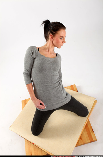 Woman Adult Athletic White Fitness poses Kneeling poses Casual