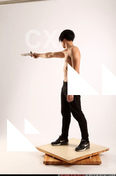 Man Young Athletic Fighting with rifle Standing poses Pants Asian