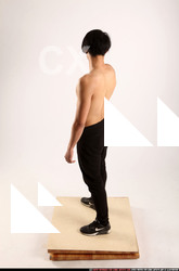 Man Young Athletic Fighting with rifle Standing poses Pants Asian