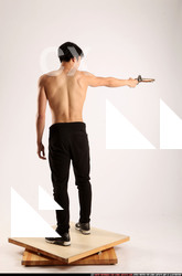 Man Young Athletic Fighting with rifle Standing poses Pants Asian