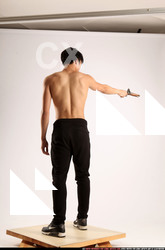 Man Young Athletic Fighting with rifle Standing poses Pants Asian
