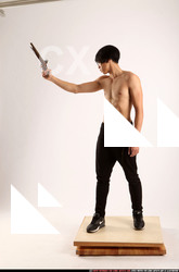 Man Young Athletic Fighting with rifle Standing poses Pants Asian