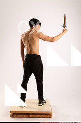 Man Young Athletic Fighting with rifle Standing poses Pants Asian