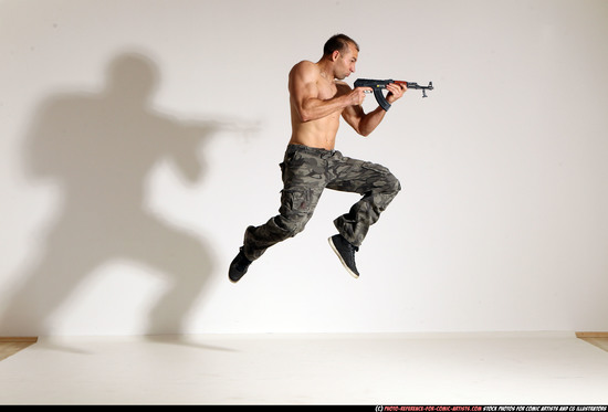 Man Adult Muscular White Fighting with submachine gun Moving poses Pants