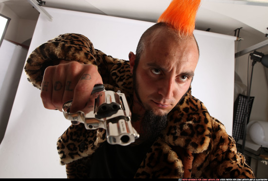 Man Adult Average White Fighting with gun Standing poses Jacket