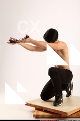 Man Young Athletic Holding Kneeling poses Pants Asian