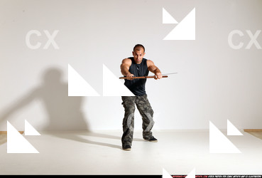 Man Adult Athletic White Fighting with sword Moving poses Casual