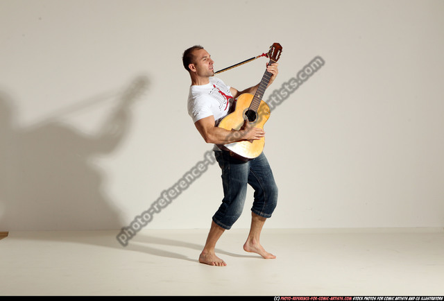 guitarist  Human poses reference, Pose reference photo, Figure poses